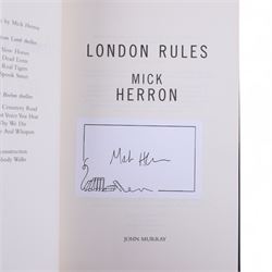 Five signed Mick Herron books, including three first editions 'Slough House', 'London Rules' and 'This is What Happened', an anniversary edition of 'Slow Horses' and a paperback copy of 'The Secret Hours'