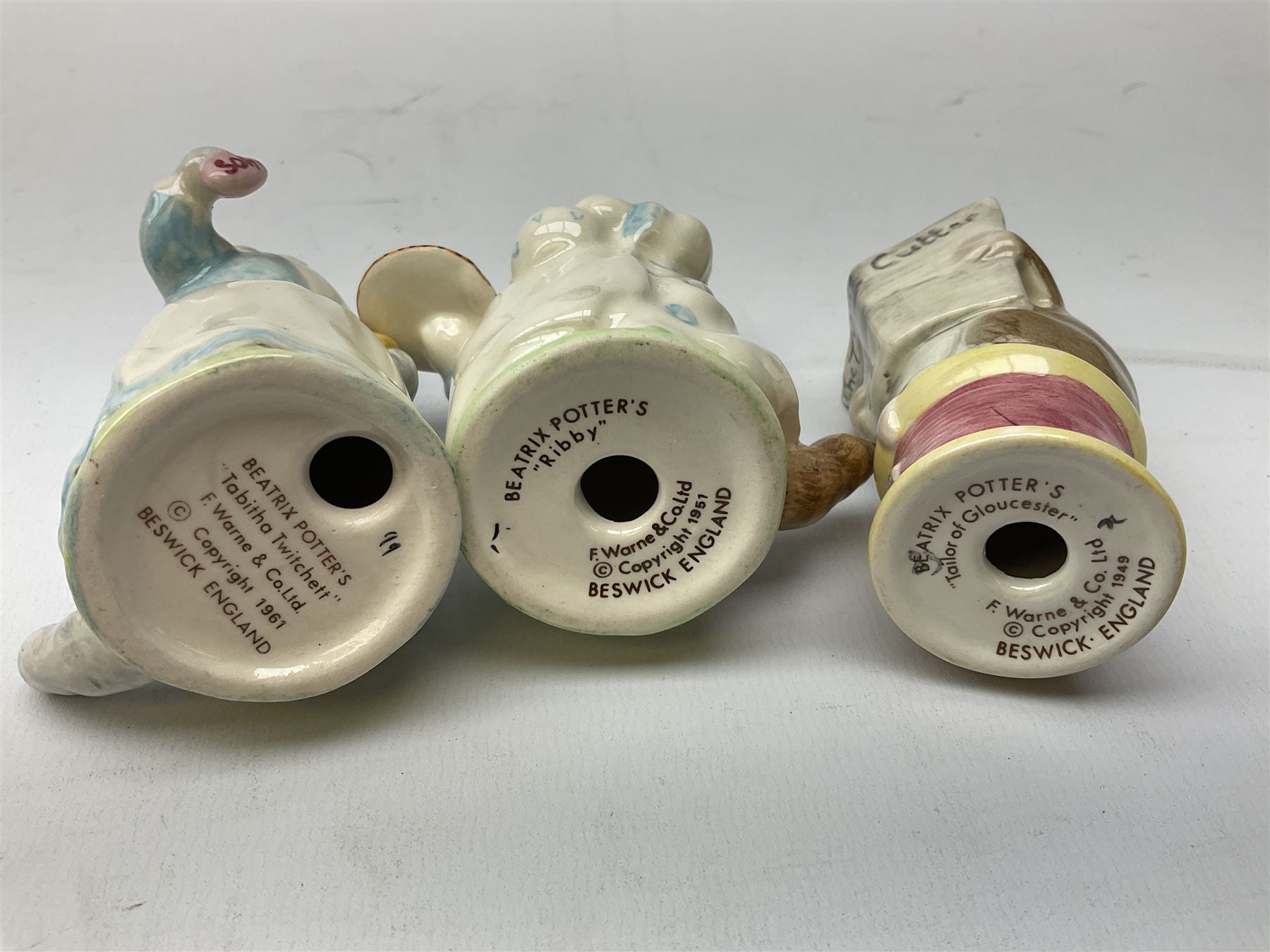 Nine Beswick Beatrix Potter figures, comprising Tabitha Twitchett, Appley Dapply, Tom Kitten Tailor of Gloucester, Ribby, Hunca Munca, Amiable guinea-pig, Miss Moppet and Poorly Peter rabbit,  all with printed mark beneath 