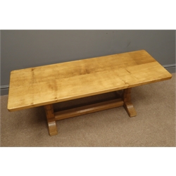  'Mouseman' rectangular adzed coffee table, two octagonal supports joined by floor chamfered stretcher, on arched sledge feet, carved with signature mouse, by Robert Thompson of Kilburn, W123cm, H45cm, D45cm  