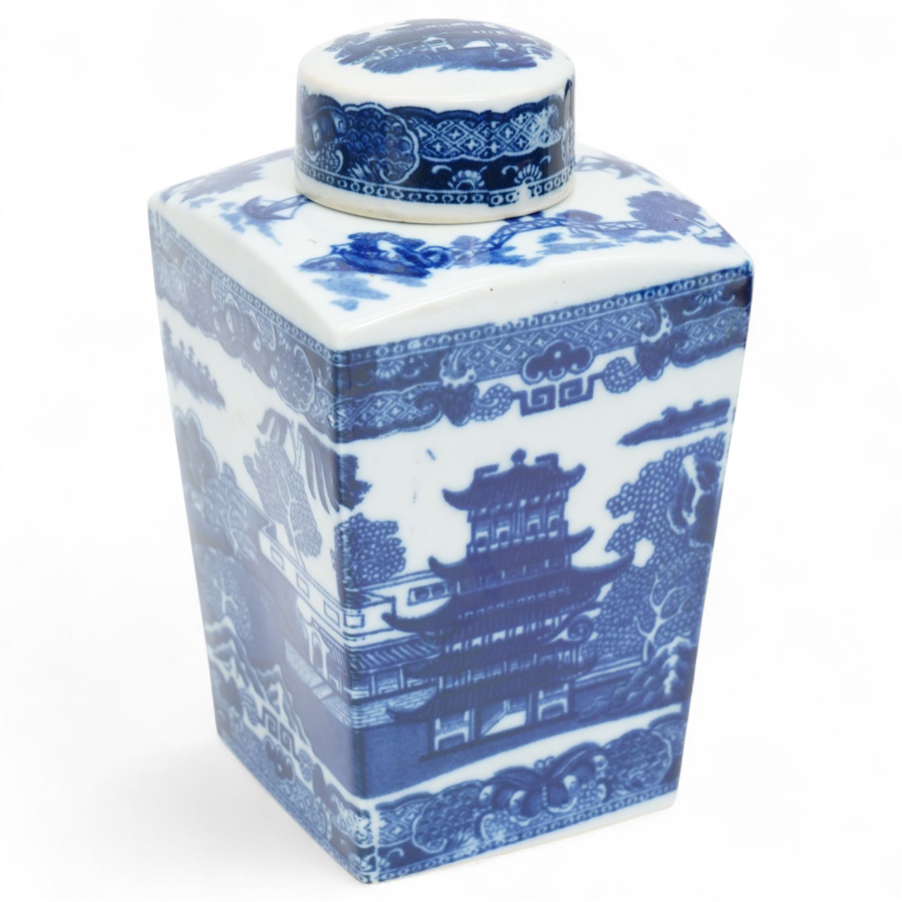 Large Spode Italian blue and white jug H23cm, 20th century Delft vase and cover decorated with landscape and floral design H38cm, Ringtons Tea Merchants blue and white tea caddy H20cm and a Ringtons jug (4)