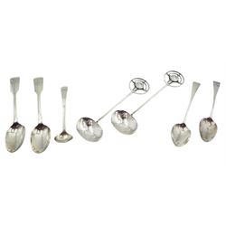 Group of silver spoons, comprising pair of George IV Fiddle pattern teaspoons, hallmarked London 1828, makers mark WT, probably William Theobalds, two further Georgian teaspoons, a Georgian salt spoon, hallmarked Newcastle, and pair of Arts & Crafts style spoons, with oval planished bowls and circular terminals with inset mother of pearl roundels, approximate gross weight 3.53 ozt (110 grams)