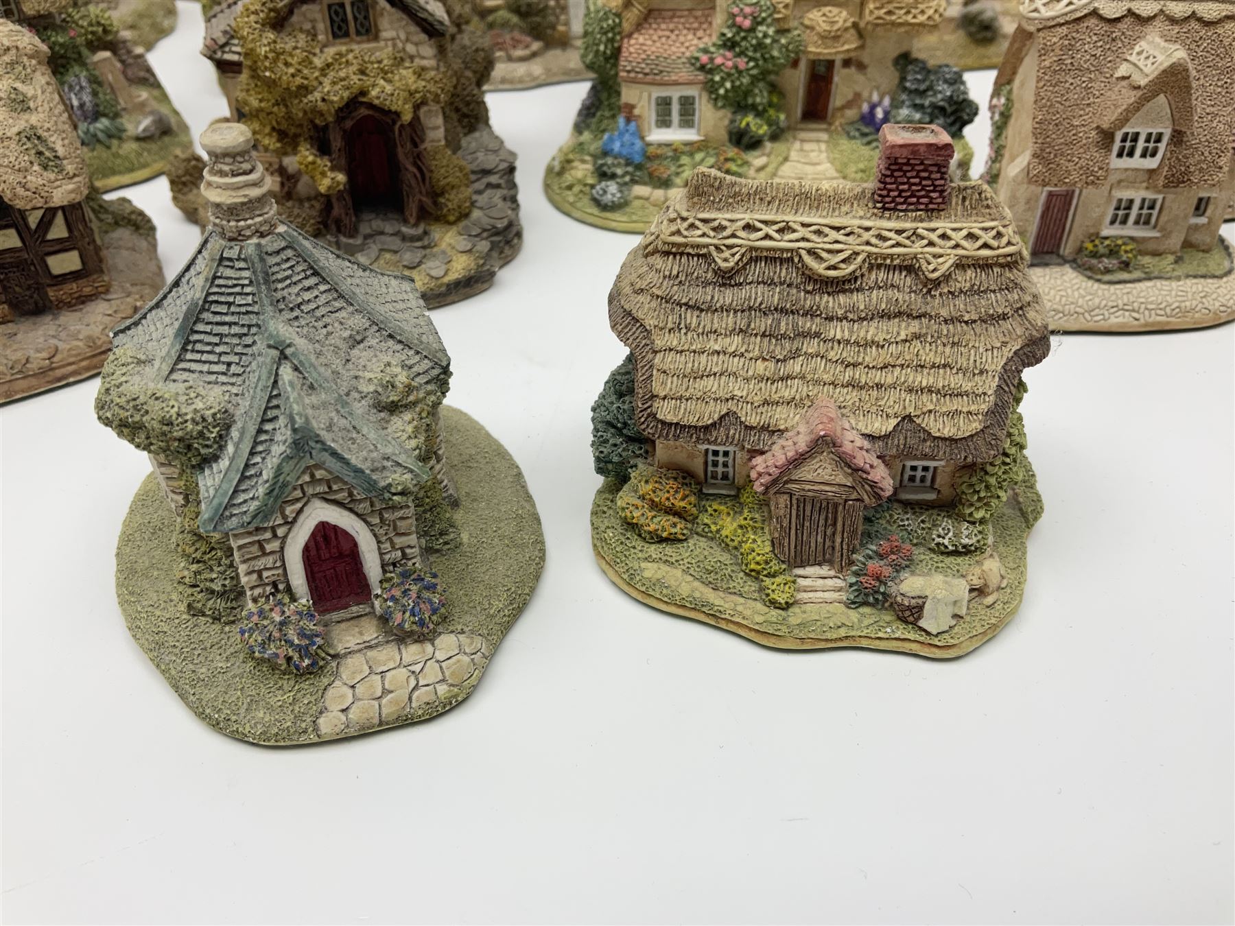 Twenty five Lilliput Lane, to include Village School, Greensted Church, The Chocolate House etc 