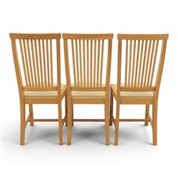 Contemporary oak dining extending table and set of six chairs, with additional leaf  extending to 182cm, chairs with cream upholstered seat