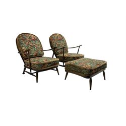 Ercol - pair of dark elm and beech easy chairs, and matching footstool 