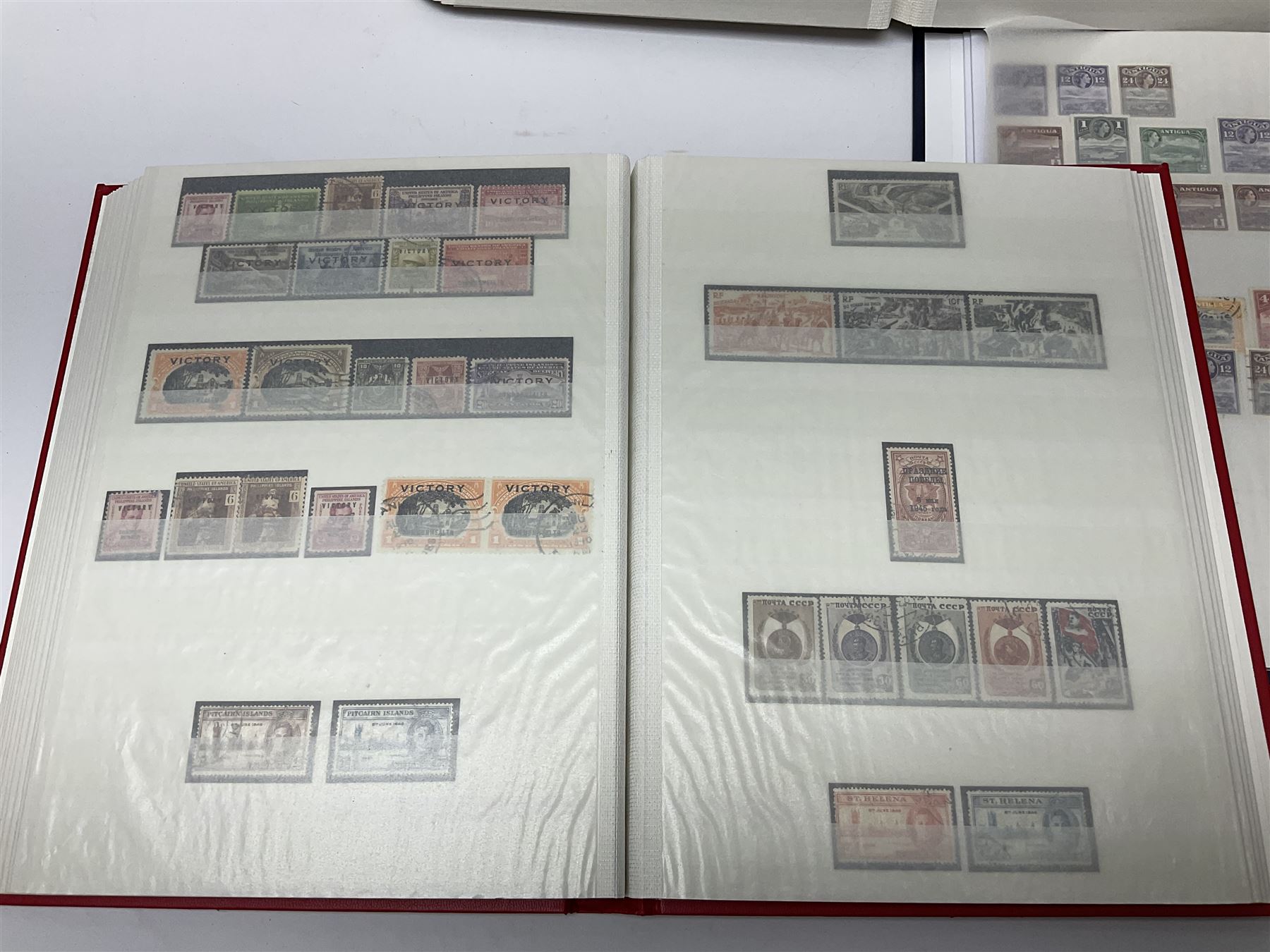 World stamps with many relating to Victory in Europe including King George VI '8th June 1946' stamps from various countries including Antigua, British Guiana, British Honduras, British Solomon Islands, Cayman Islands, Ceylon, Fiji, Grenada, Montserrat, St Helena etc, both mint and used stamps seen, housed in three stockbooks