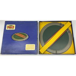 Hornby Dublo - six D1 accessories comprising Turntable; Through Station with separately boxed Platform Extension with Wall; Signal Cabin with orange roof and two packs of station names; Level Crossing; and Island Platform; all boxed (6)