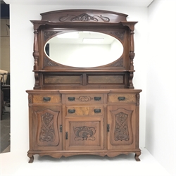 Edwardian walnut mirror back breakfront sideboard, raised shaped cresting rail, turned tapering column supports, four drawers above three cupboards, W156cm, H216cm, D58cm