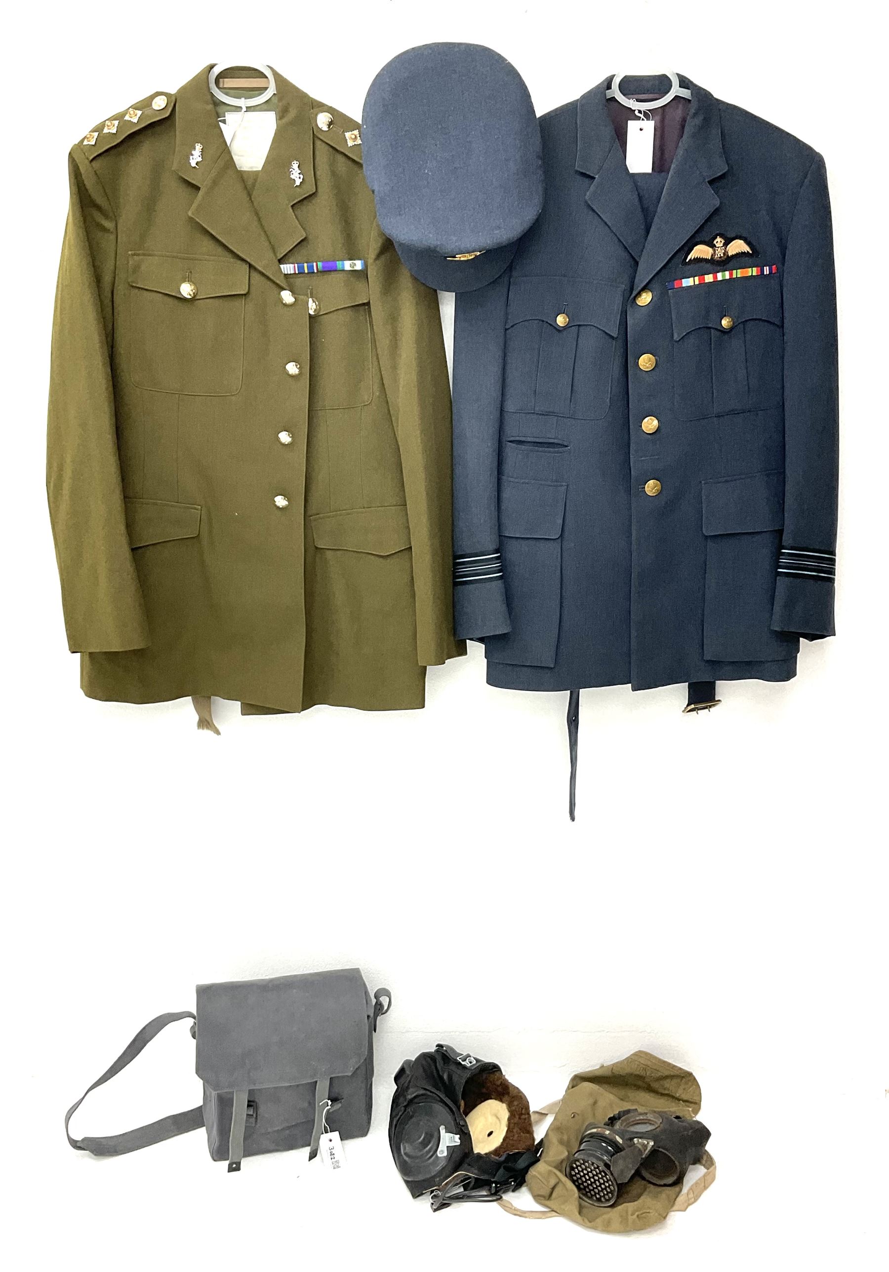 RAF Flight Lieutenant's uniform with peaked cap and WW2 ribbon bar; WW2 gas mask in blue canvas bag dated 1942; flying helmet date 1984; and British Army Major's uniform with Staybrite buttons and peaked cap