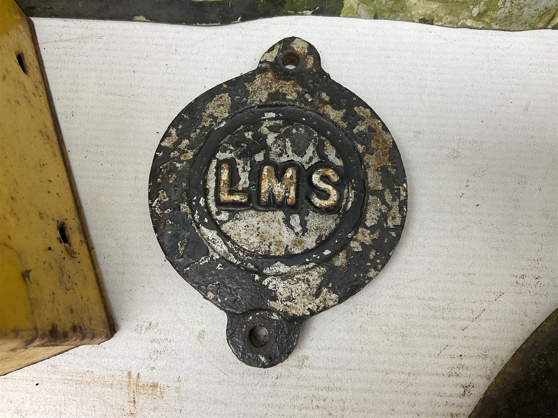Victorian cast iron railway wagon plate, 'To Carry 10 Tons 4012, Registered by LNER-D 1898', together with a similar mid 20th century example, a smaller cast iron LMS wagon plate, Chalwyn signalling lamp, Give Way to Trains enamel sign and an enamel signal sign