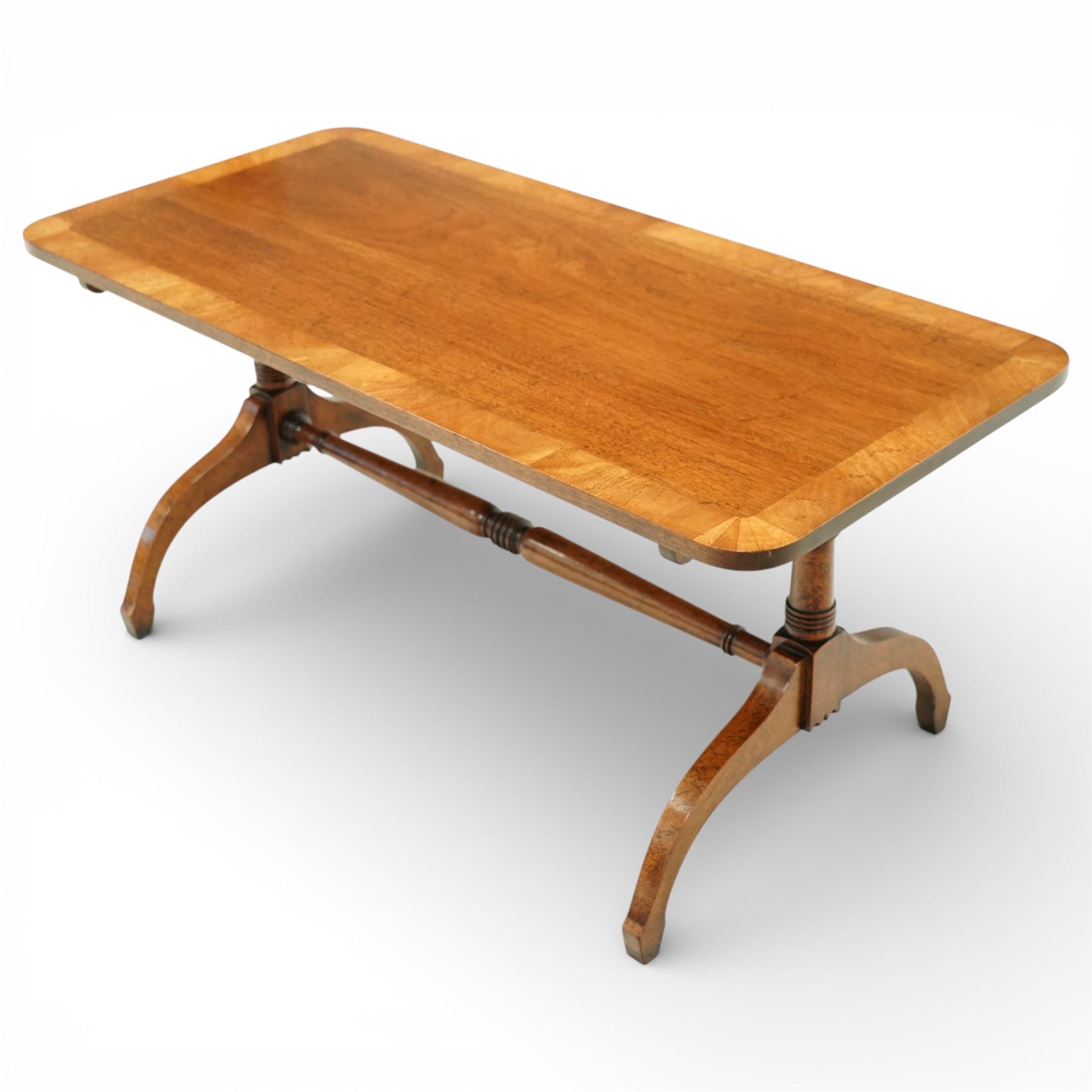 20th century Queen Anne style walnut sofa table, rectangular top with quarter veneered corners, raised on cabriole legs united by a turned stretcher