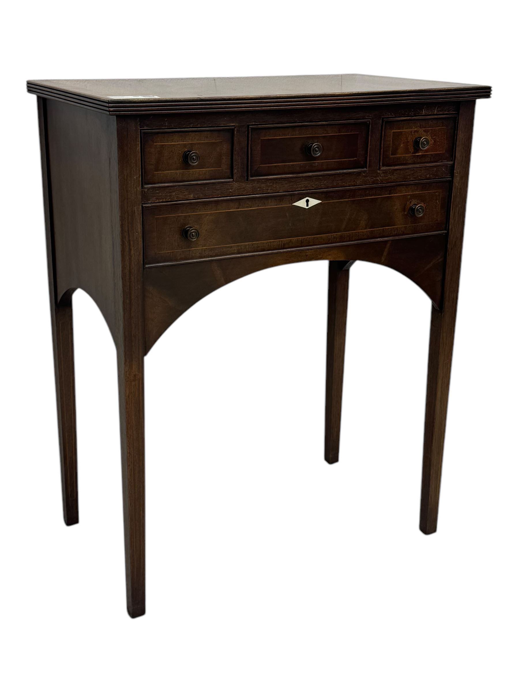 Georgian design inlaid mahogany side table, rectangular top with fluted edge over three short and one long drawer, arched apron, raised on slender supports 