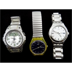 Two Swatch wristwatches and a Casio wave ceptor wristwatch