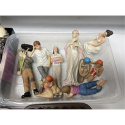 Collection of miniature composite dolls house figures, to include chimney sweep and grocer, together with miniature dolls house tins, cushions, rugs and garden flowers and accessories, etc, in two boxes