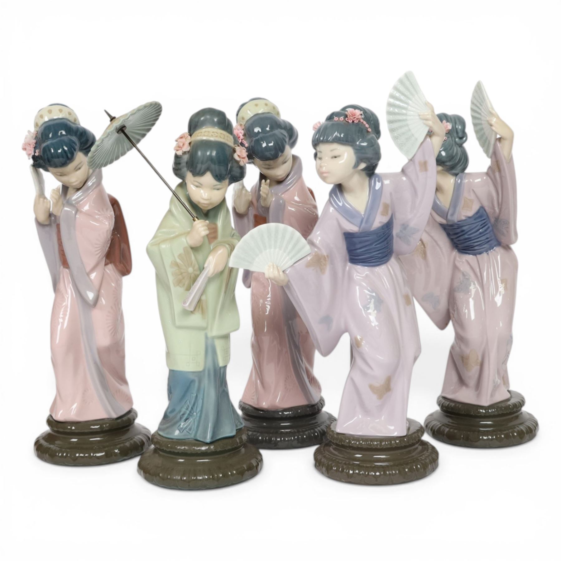 Five Lladro Japanese figures, comprising Oriental Spring no 4988, two Chrysanthemum no. 4990 and two Madame Butterfly no. 4991