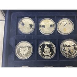 The Royal Mint Golden Wedding Anniversary silver proof coin collection, comprising twenty-four international commemorative coins, cased with certificates