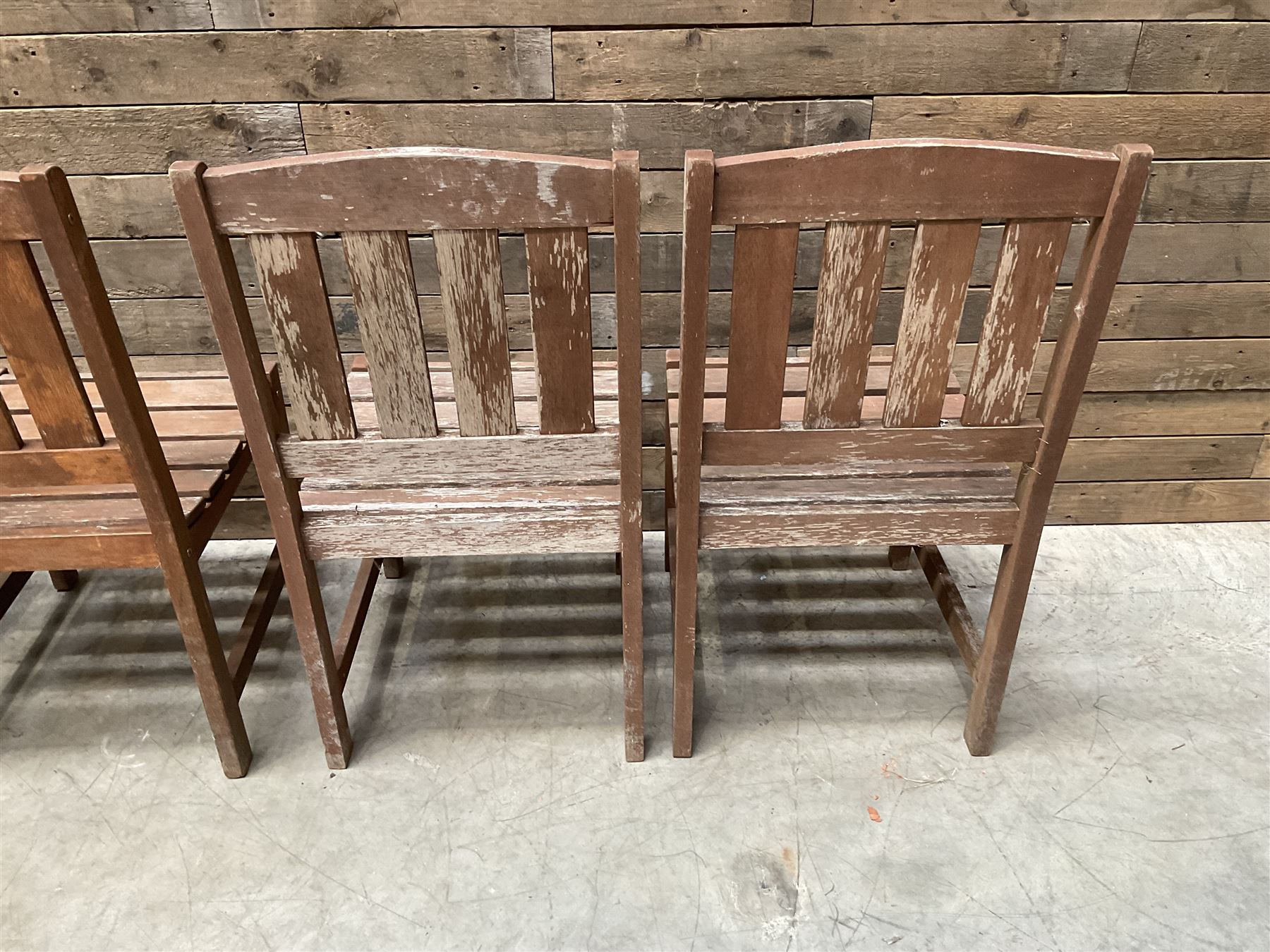 Set of 4 wooden garden chairs