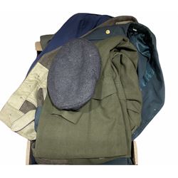 Quantity of military clothing to include jackets, trousers and hat etc