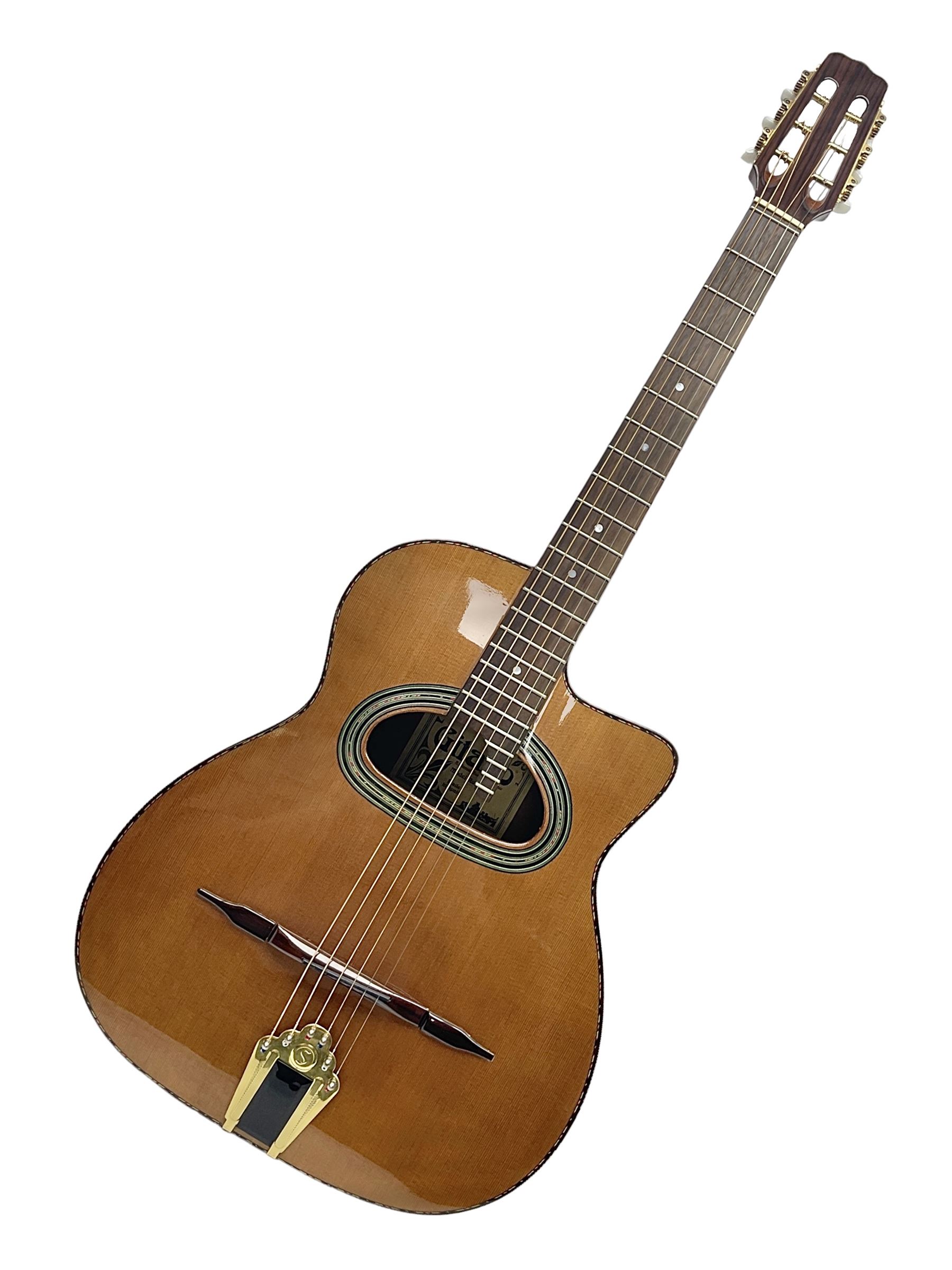 Spanish Gitano Manuel Rodriguez Maccaferri guitar, model no.EMC1; bears label; L98cm; in lightweight carrying case