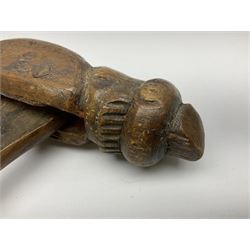 Rare primitive treen lever action nutcracker, probably late 17th/early 18th century, carved in the form of a man, with old collector label to side inscribed 'A Nutcracker XVI Century', H18cm