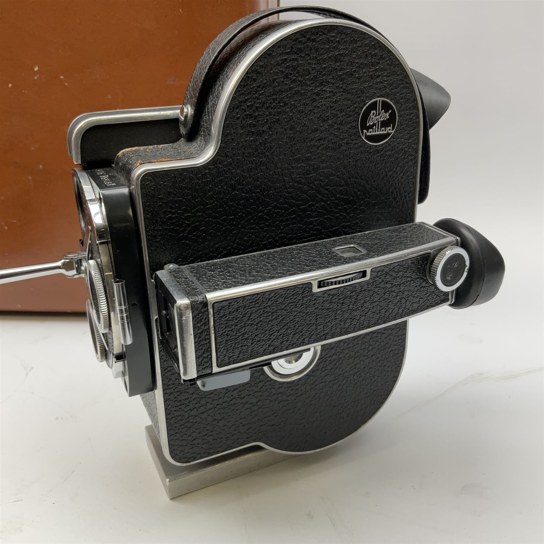 Paillard Bolex H16 Reflex 16mm cine camera with handgrip and turret for interchangeable lenses, KERN Vario-Switar 1:1,9 f=16-100mm POE BOLEX H16RX lens, KERN Switar 1:1,4 f=25mm H16 RX lens, KERN Switar 1:1,9 f=75mm lens, KERN Switar 1:1,6 f=10mm H16 RX lens