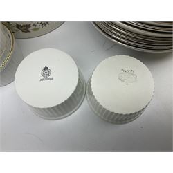 Royal Doulton tea and dinner wares decorated in the Vanity Fair pattern, to include twelve dinner plates, twelve side plates, eleven bowls, three lidded tureens, ten teacups, sauceboat on stand etc, together with boxed Royal Worcester plate, six Royal Worcester ramekins etc