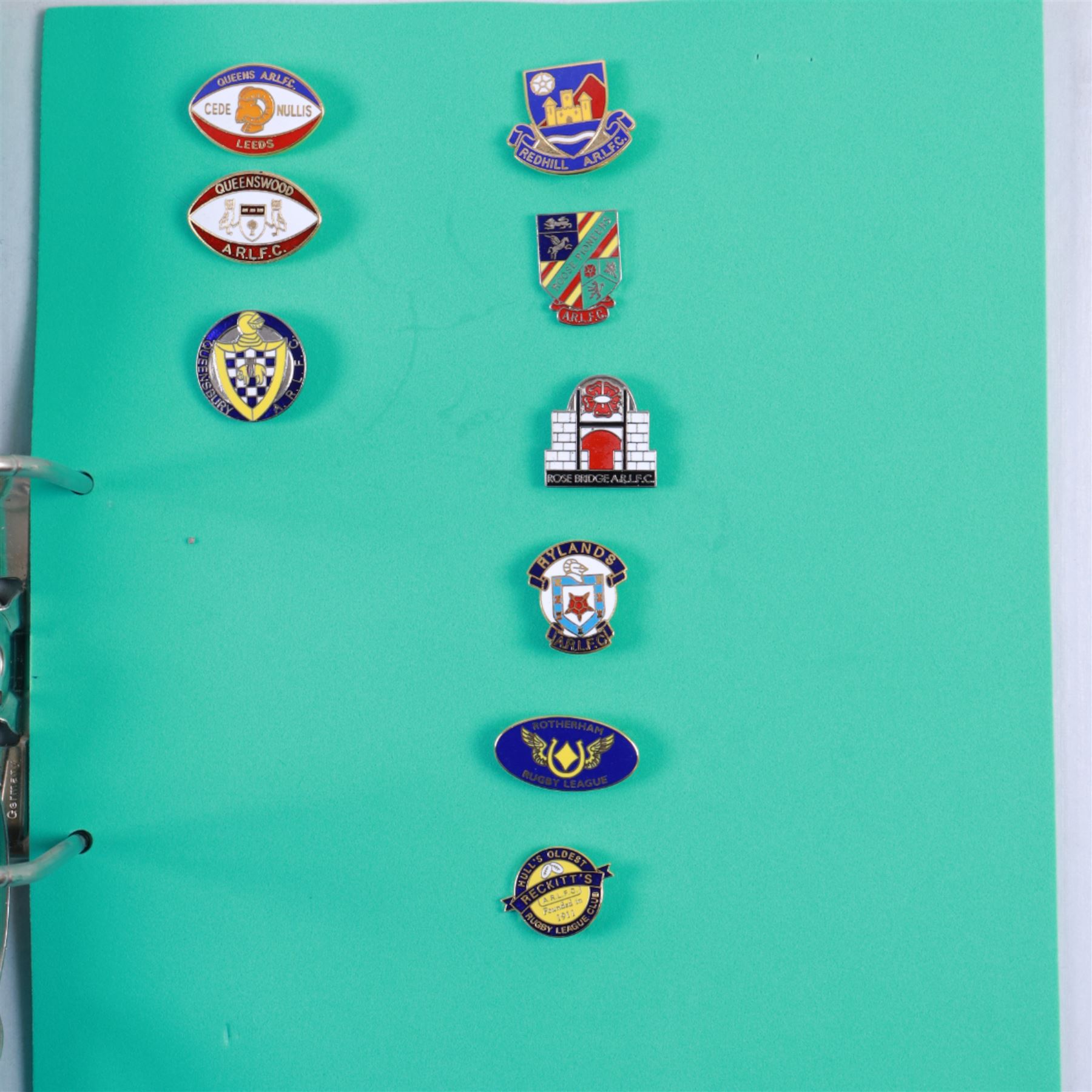 Amateur rugby league enamel badge collection, teams including Birmingham Bulldogs, Bridlington, Dudley Hill, Duke of York, Edinburgh Eagles, Guiseley, Rangers, Huntingdon, Keighley Town, Leigh Miners, Pilkington Recs, St Josephs, Thornhill Trojans, West London Sharks etc, all displayed in three folders and six amateur league badges from Leeds & District, Hull & District, York & District, Warrington, Lancashire County and Yorks County in box display, (approximately 270)