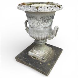 Pair of large stone Campana urns on square bases