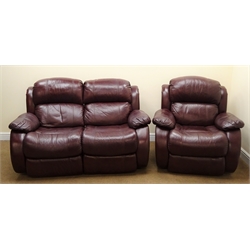  Two seat reclining sofa, upholstered in a maroon leather (W158cm) and a matching armchair (W100cm)  