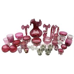 Group of Victorian and later cranberry glass, to include pair of Mary Gregory style vases, and similar beaker 