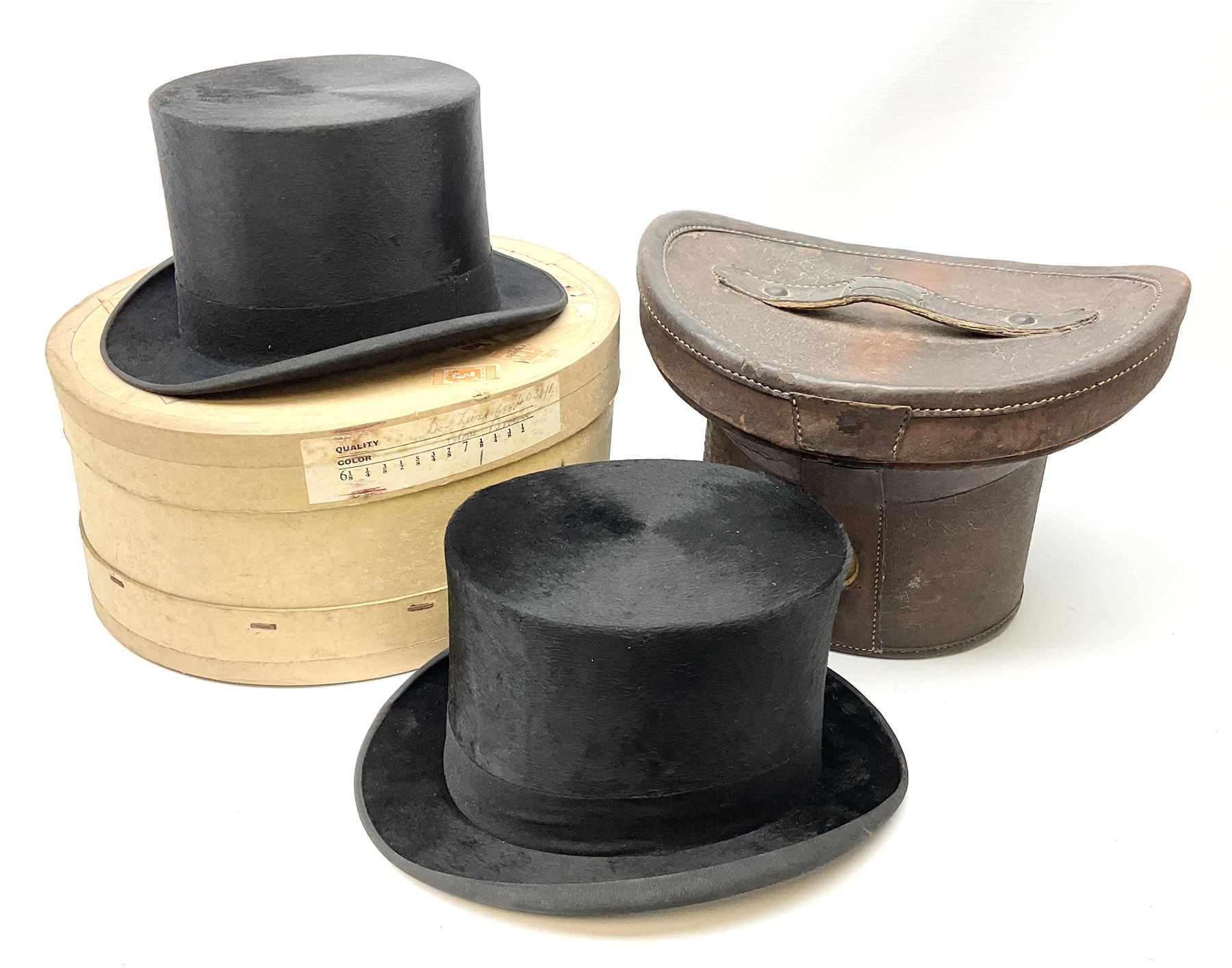 Top hat by Tress & Co London, in a  fitted leather leather case,  Top hat by Chapellerie Francaise. 