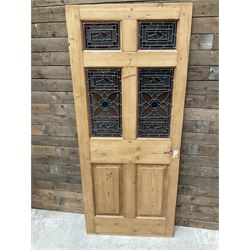 Early 20th century pine six panel door with later stained glass panels