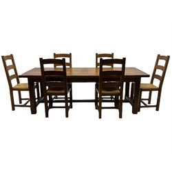 Antix French oak dining table with two leaves, two frieze drawers;, and six ladder back chairs with rush seats