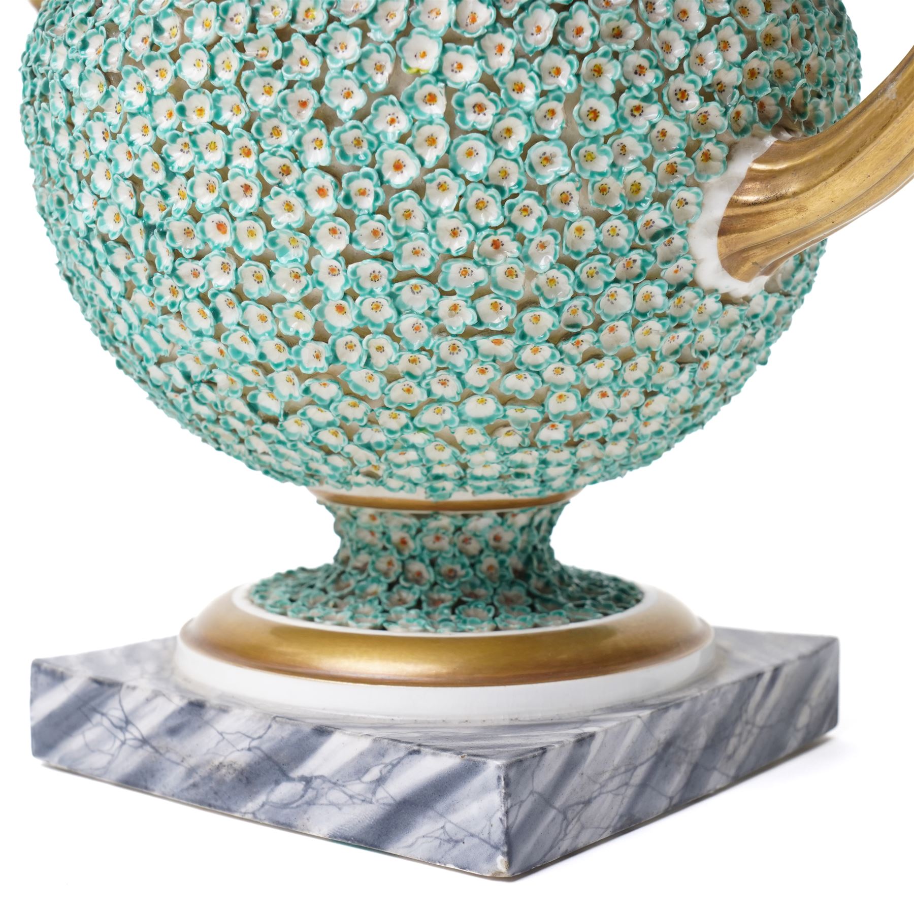 Pair of 19th century Grainger Lee & Co Worcester urns, c1820s-1830s, hand-painted with views of 'Near London Bridge' and 'Brighton Pavilion' upon a ground of encrusted forget-me-not decoration, the beaded rim with twin naturalistically formed handles, leading into vines moulded with strawberries in high relief, the pedestal painted to imitate marble, painted marks to base, H20cm