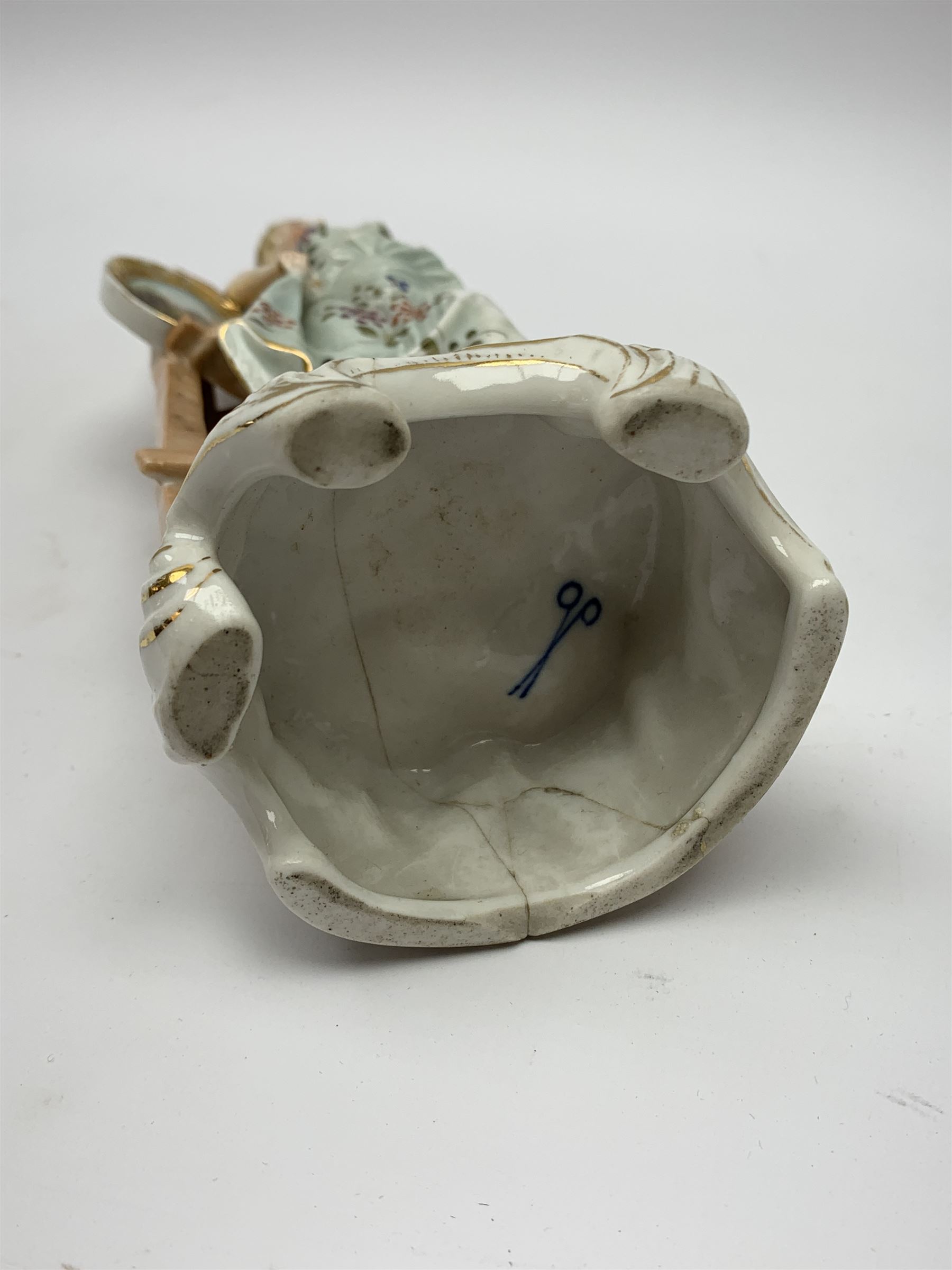 A group of five Continental figurines modelled as the arts, emblematic of music, painting, sculpture, literature, and theatre, each with spurious blue cross mark beneath, H22.5cm. (5). 