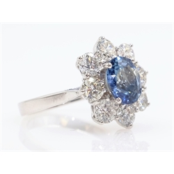  White gold oval sapphire and round brilliant cut diamond cluster ring hallmarked 18ct sapphire approx 2 carat diamonds approx 1.8 carat  