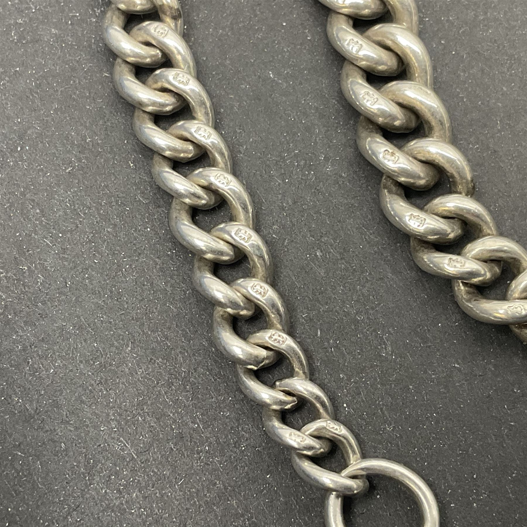 Early 20th century silver tapering Albert chain, hallmarked to T bar and clips, with lion passant stamped on each link