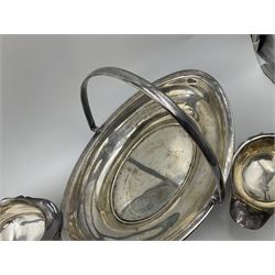 Silver plated seven bar toast rack by Mappin & Webb, together with other silver plated items including pair of bottle coasters, swing handled baskets and two sauce boats