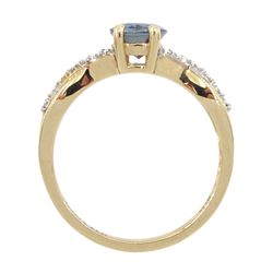 9ct gold oval tanzanite and diamond openwork ring, hallmarked 
