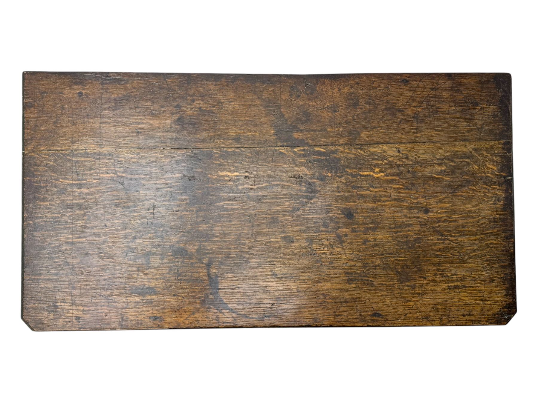 18th century oak lowboy, rectangular moulded top over three frieze drawers with brass swing handles, scalloped apron, on slender square section supports