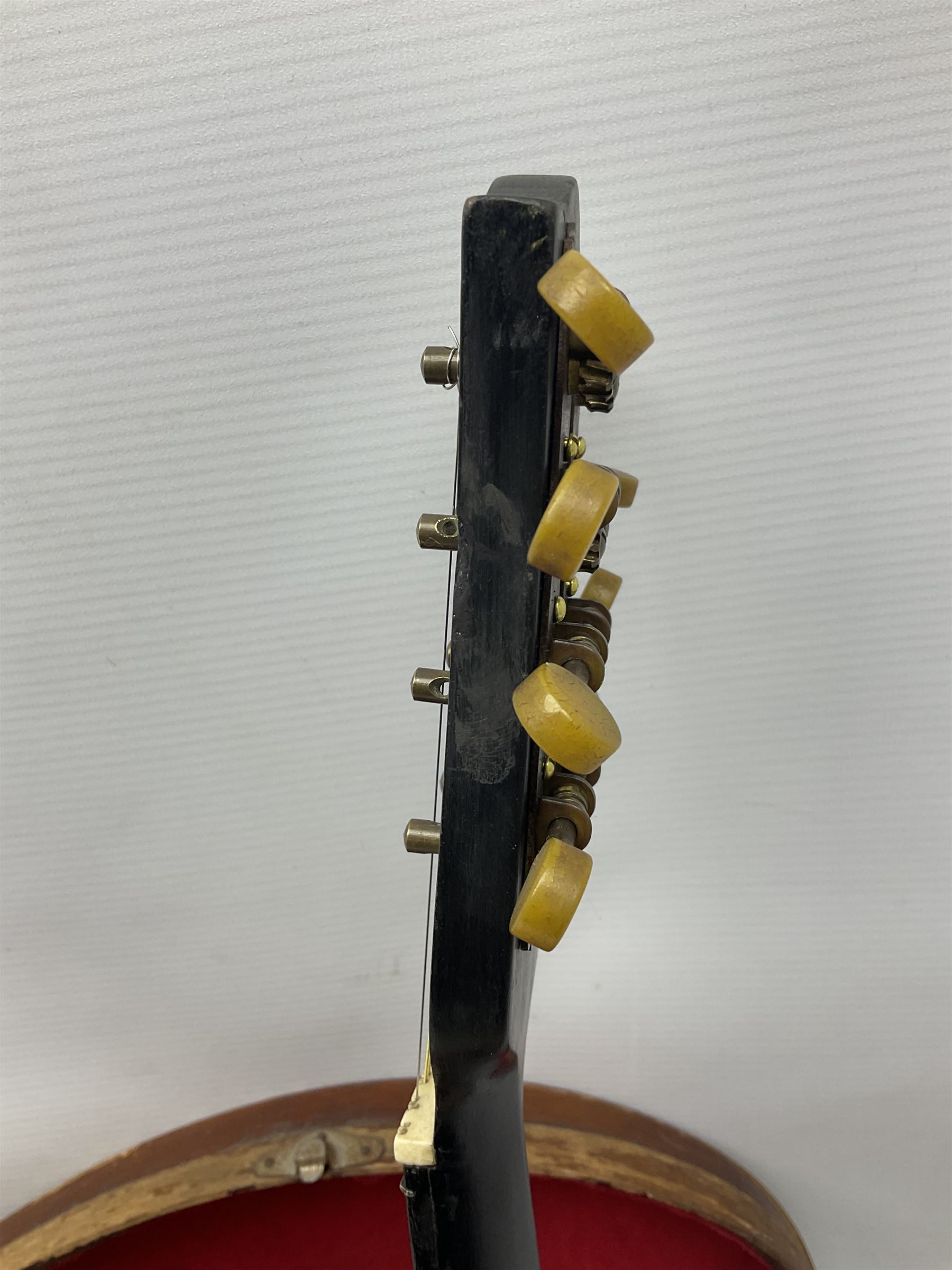 Early 20th century Italian Rafaele Disantino eight-string mandolin with two-piece back and spruce top with stamped Rafaele Disantino signature; bears maker's label L61cm; in wooden carrying case