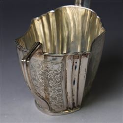 Late Victorian silver twin handled open sucrier and milk jug, of fluted form with panels of engraved foliate decoration, hallmarked D & M Davis, London 1896