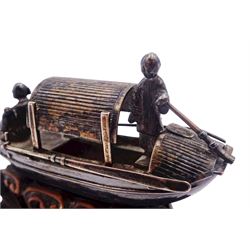 Chinese miniature silver model of a junk, with character mark to stern, mounted upon a carved wooden stand, overall H5cm L6.5cm