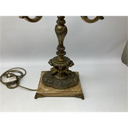 French style gilt metal four branched candelabra supported by fawns and upon a rectangular lion claw base, H77cm 