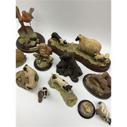 A Border Fine Arts figure, Scottish Black Faced Sheep with Collie, by Ray Ayres, on base, L30cm, together with three further Border Fine Arts figures, two examples modelled as Jack Russel Terriers, the third example modelled as a rabbit, plus a selection of other figures, including five by Country Artists, a bronze effect Heredities figure of a Jack Russel Terrier, etc.