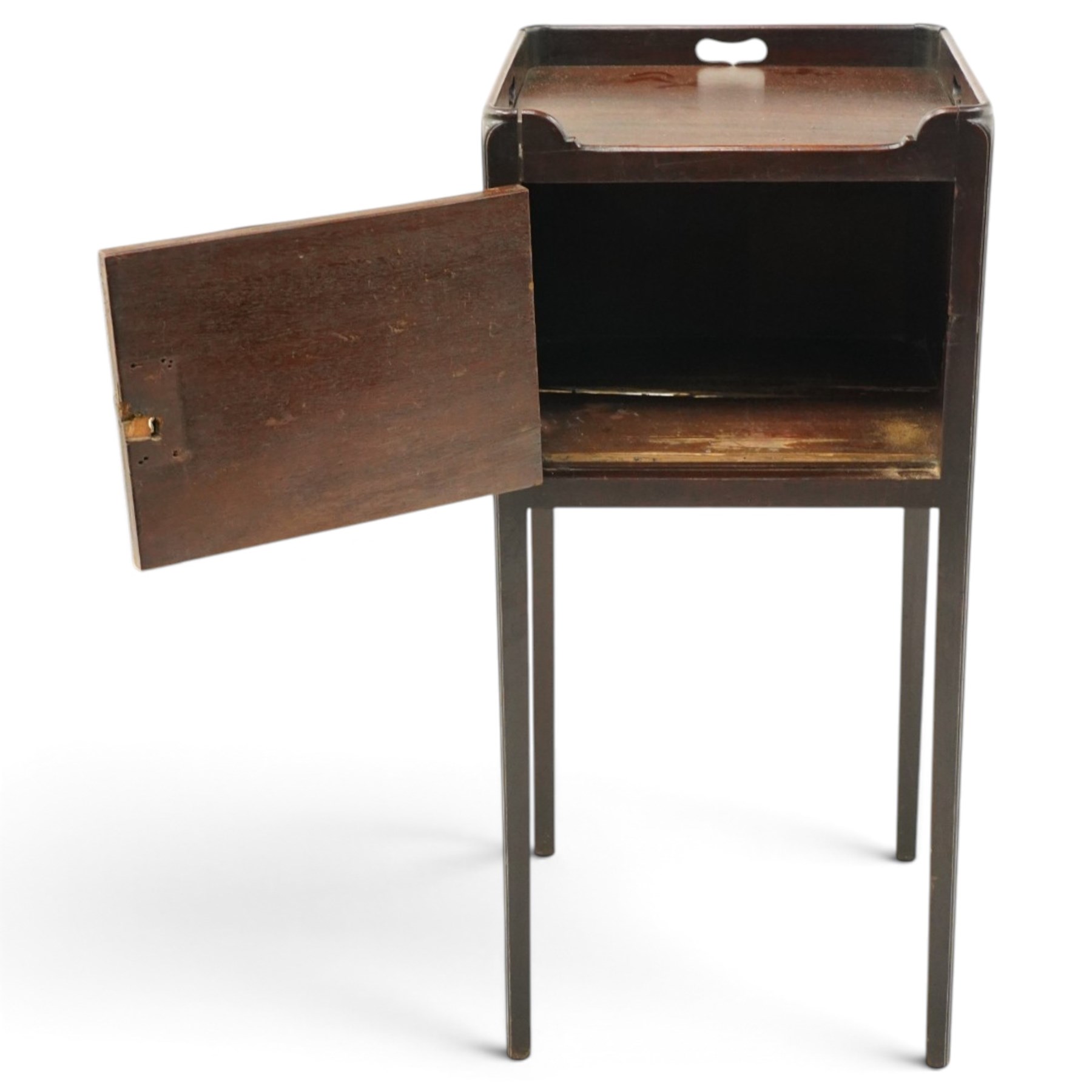George III mahogany bedside pot cupboard, rectangular tray top with raised three-quarter gallery with pierced handles, fitted with single cross-banded cupboard, on square tapering supports