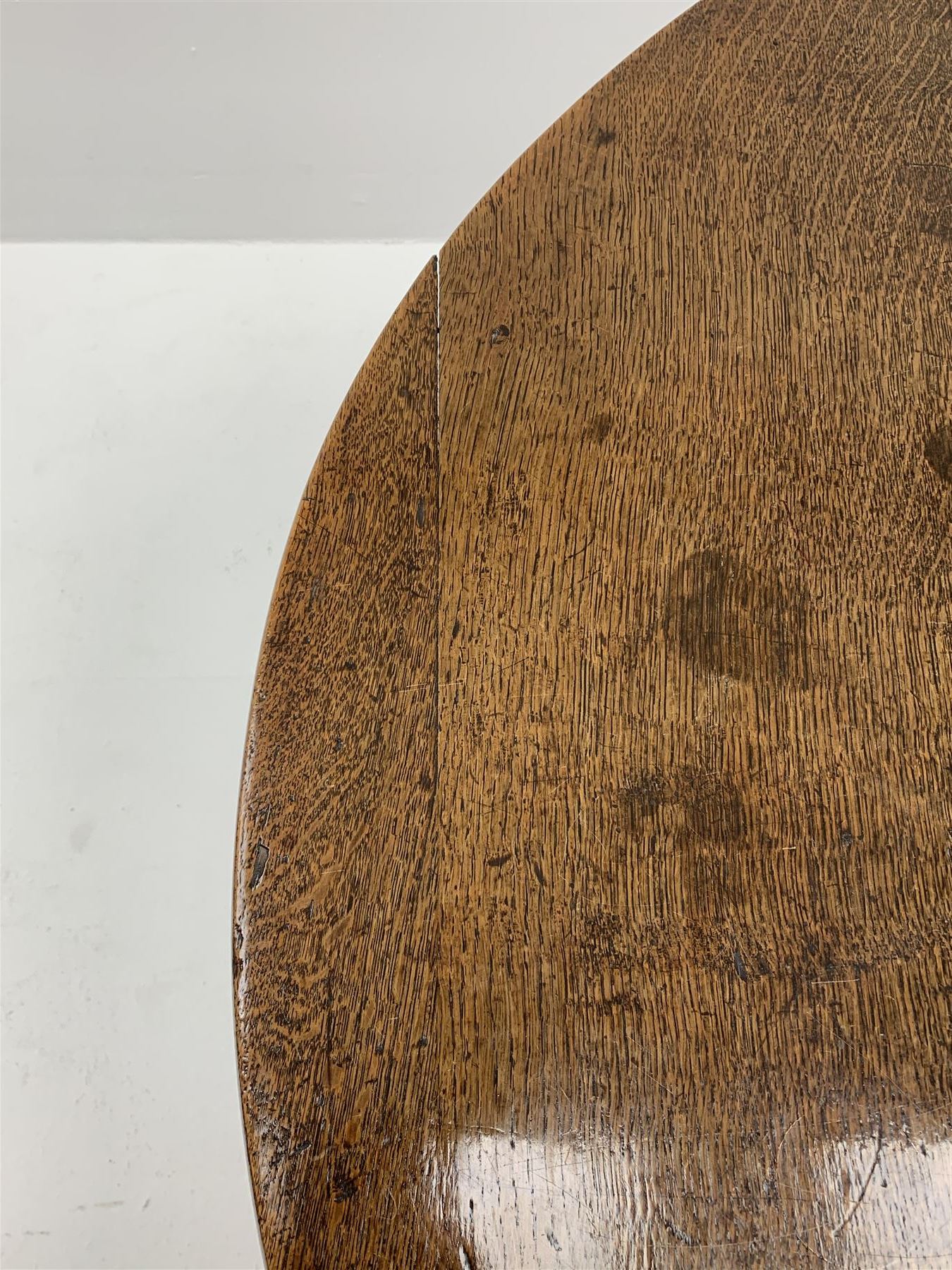 Late 17th century William & Mary oak drop leaf dining table, oval drop leaf top, single drawer to one end, gate action base, turned supports joined by bobbin turned stretchers, 121cm x 135cm, H75cm (open)