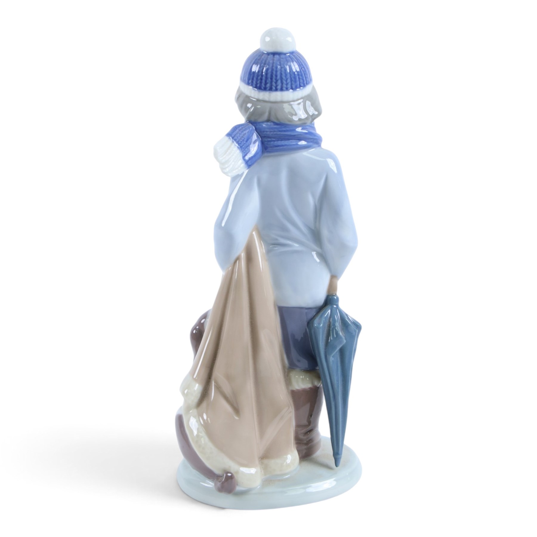 Lladro gres figure Boy on Bridge no.2237, together with Winter Boy no 5220 and a Nao figure