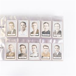 Collection of Edwardian and later Football related trading and cigarette cards, including forty-nine of fifty 1906 Ogden's Football Club Colours, 1922 PALS Footall series, ninety of one hundred 1925 Gallaher Famous Footballers, complete set of forty-four 1926 Ogden's Captains of Association Football Clubs and Colours, complete set of fifty 1927 Players Football Caricatures by MAC,  complete set of fifty 1927 Players Football Caricatures by RIP,  complete set of fifty 1930 Players Association Cup Winners, complete set of 50 1933 Ogdens AFC Nicknames etc, housed in brown cigarette card album