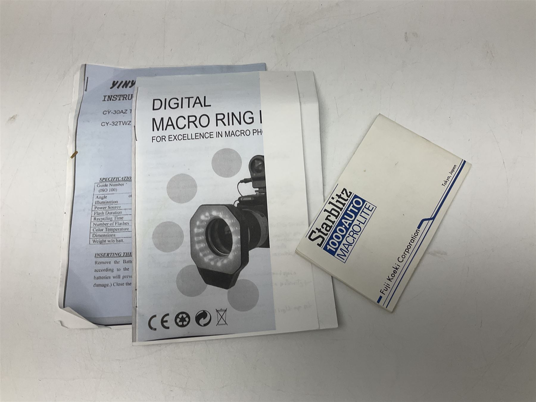 Yukon rubber armoured compact variable power spotting scope (boxed), together with Bresser 10x50 binoculars, Bushnell Excursion 10x42 binoculars, camera equipment etc  