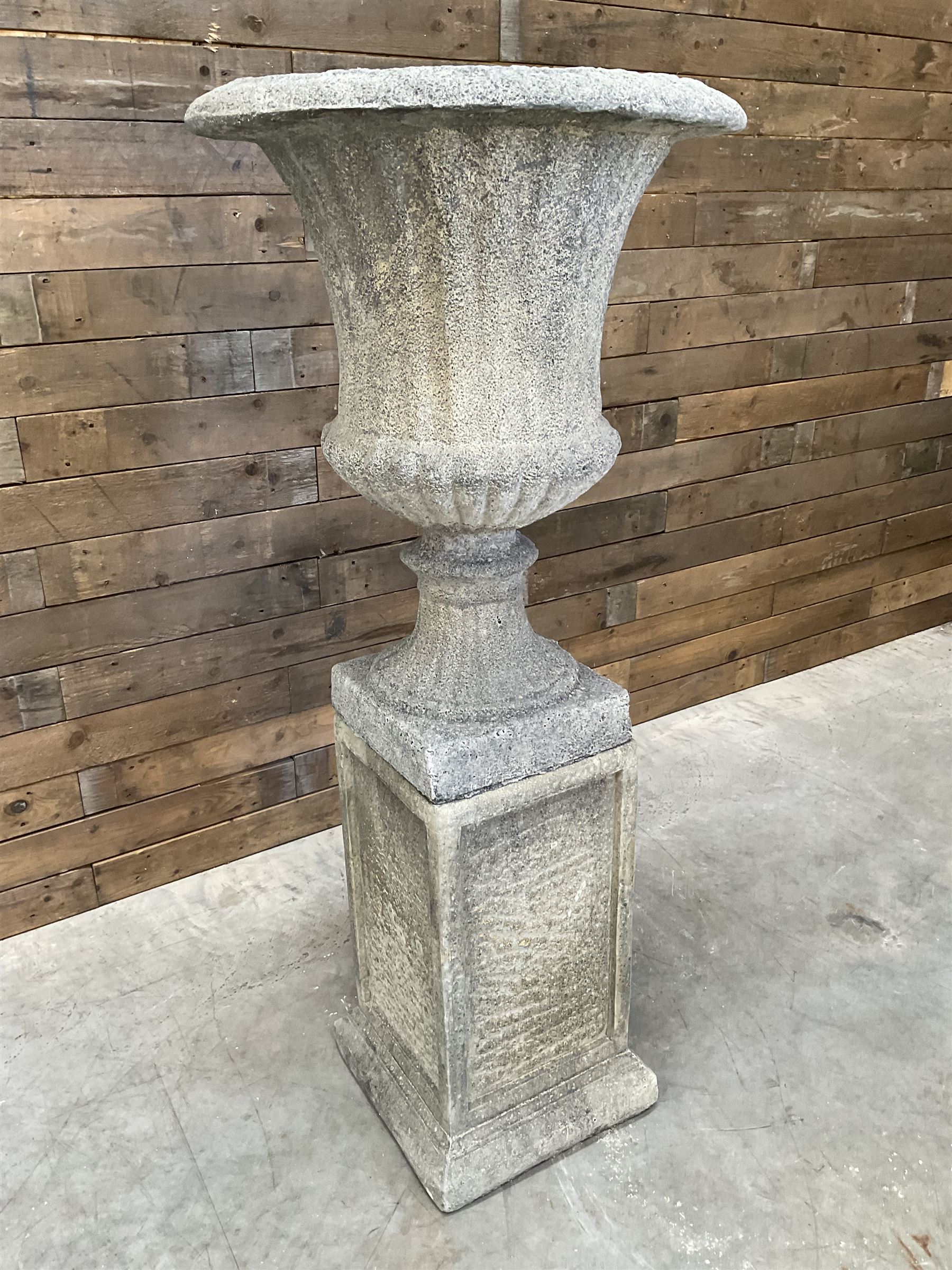 Large Georgian design cast stone garden centre-piece urn, egg and dart border, tapering column on square base, raised on square column